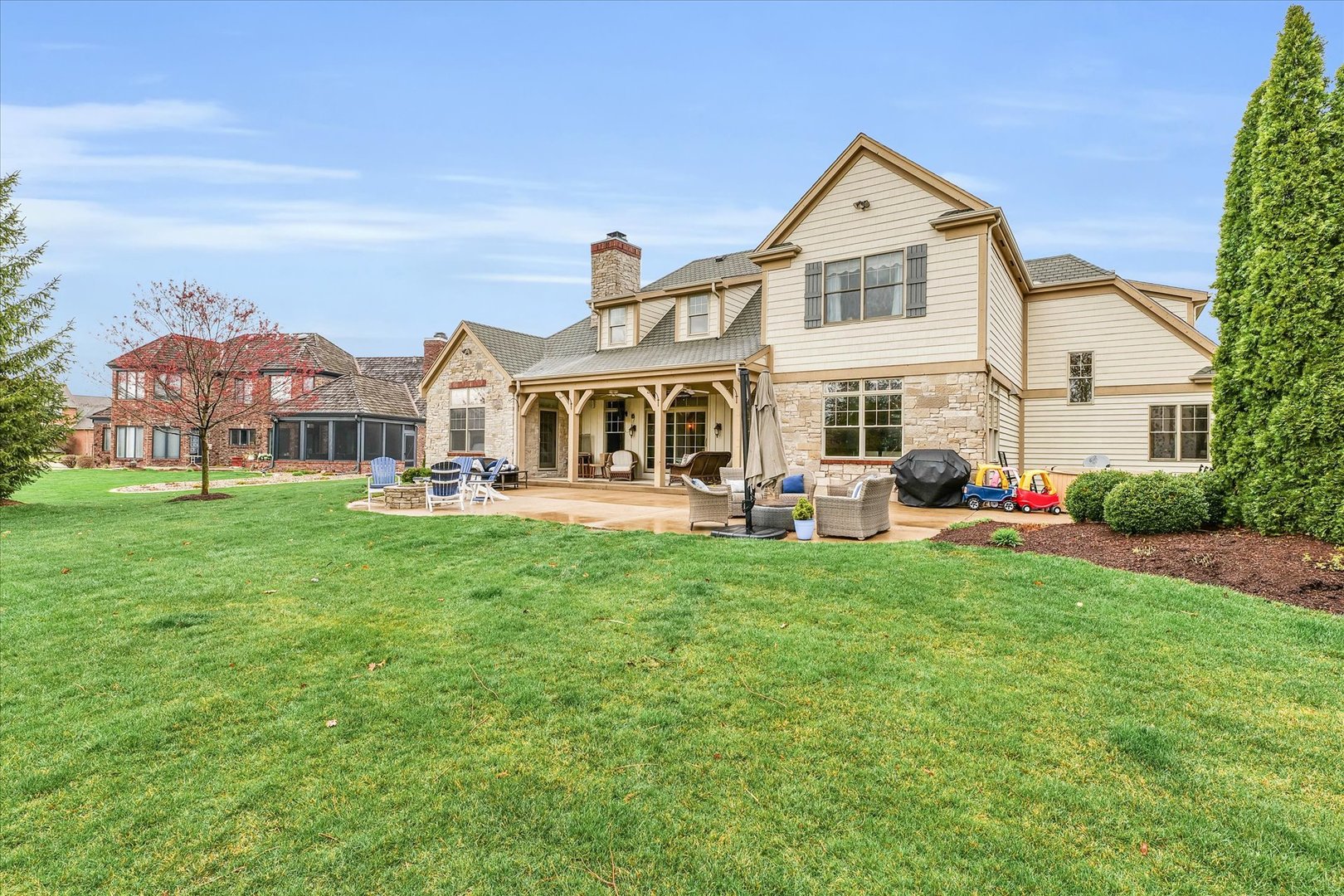1803 Cobblefield Court Champaign, IL 61822 - Photo 50 of 55 a front view of a house with garden