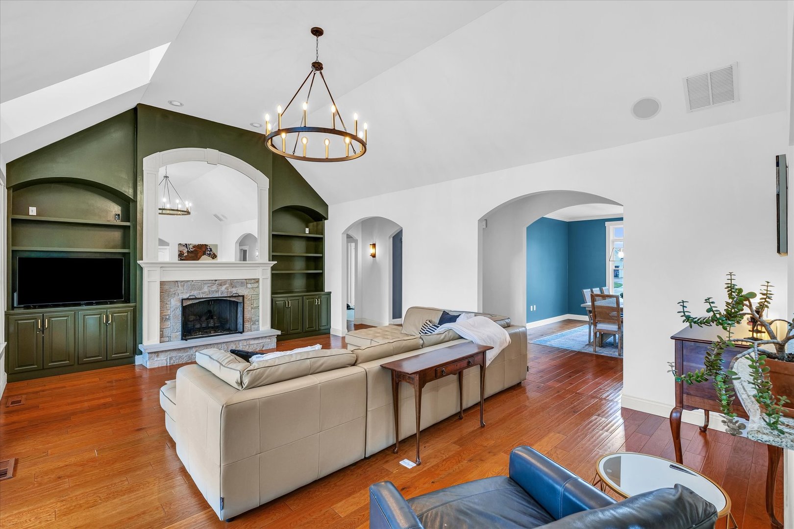 1803 Cobblefield Court Champaign, IL 61822 - Photo 7 of 55 a living room with furniture fireplace and wooden floor