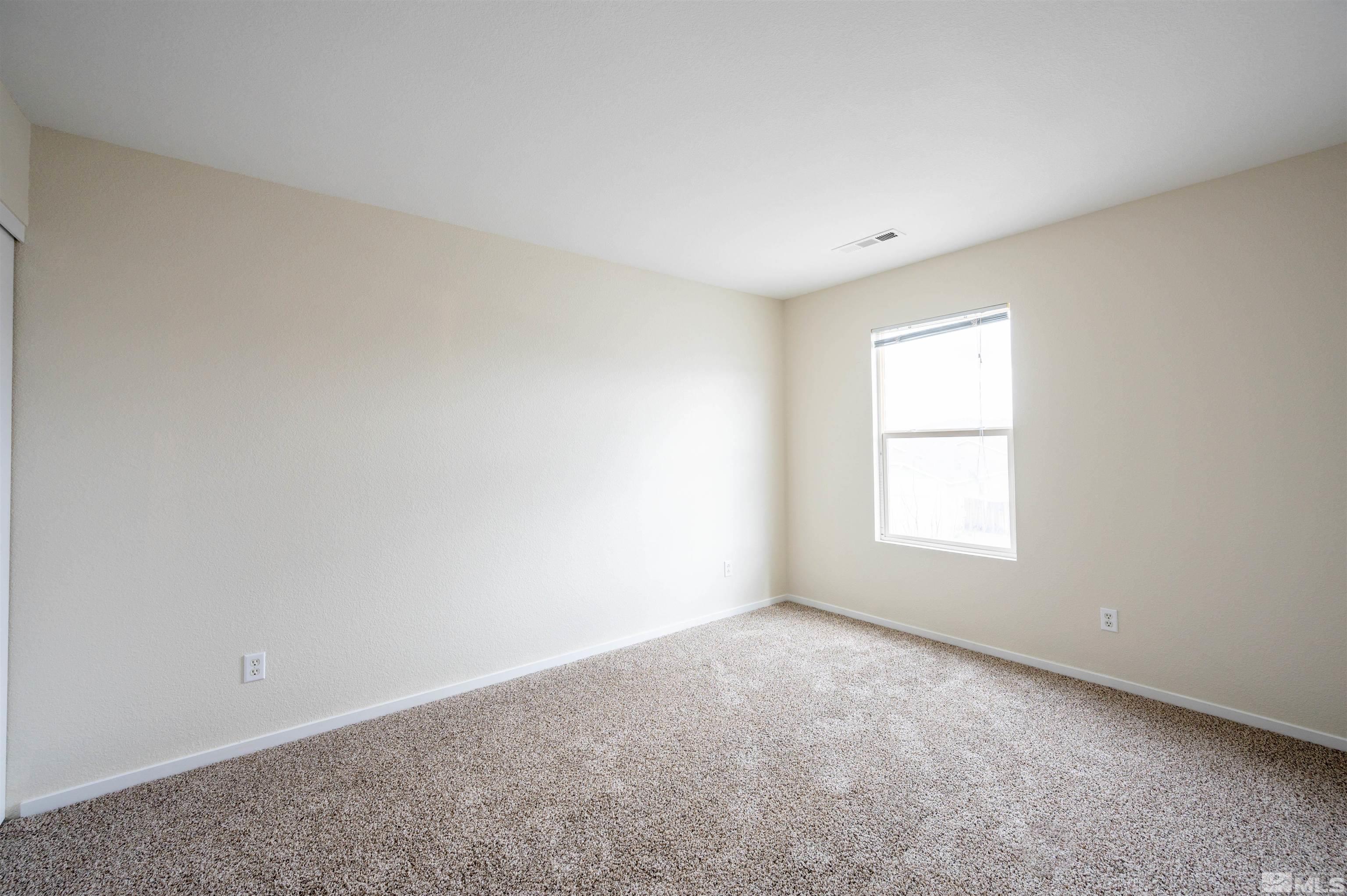 9615 Autumn Leaf Way Reno, NV 89506 - Photo 13 of 24 an empty room with a window
