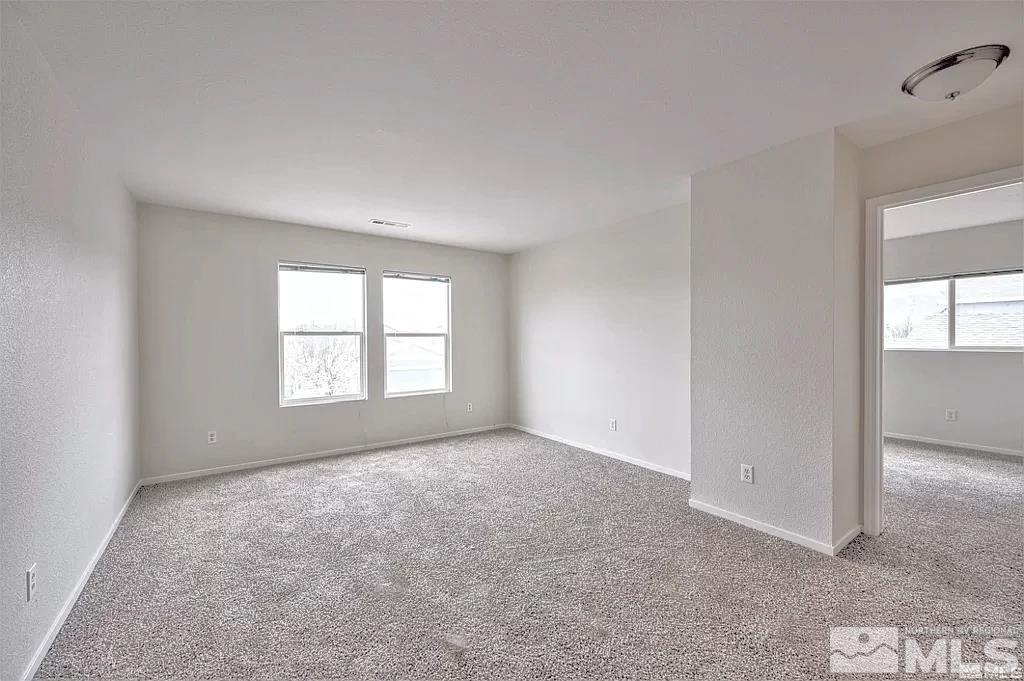 9615 Autumn Leaf Way Reno, NV 89506 - Photo 15 of 24 a view of an empty room with a window