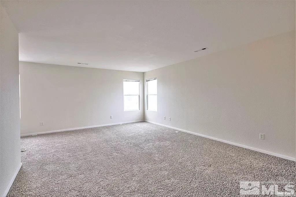 9615 Autumn Leaf Way Reno, NV 89506 - Photo 16 of 24 a view of an empty room with a window