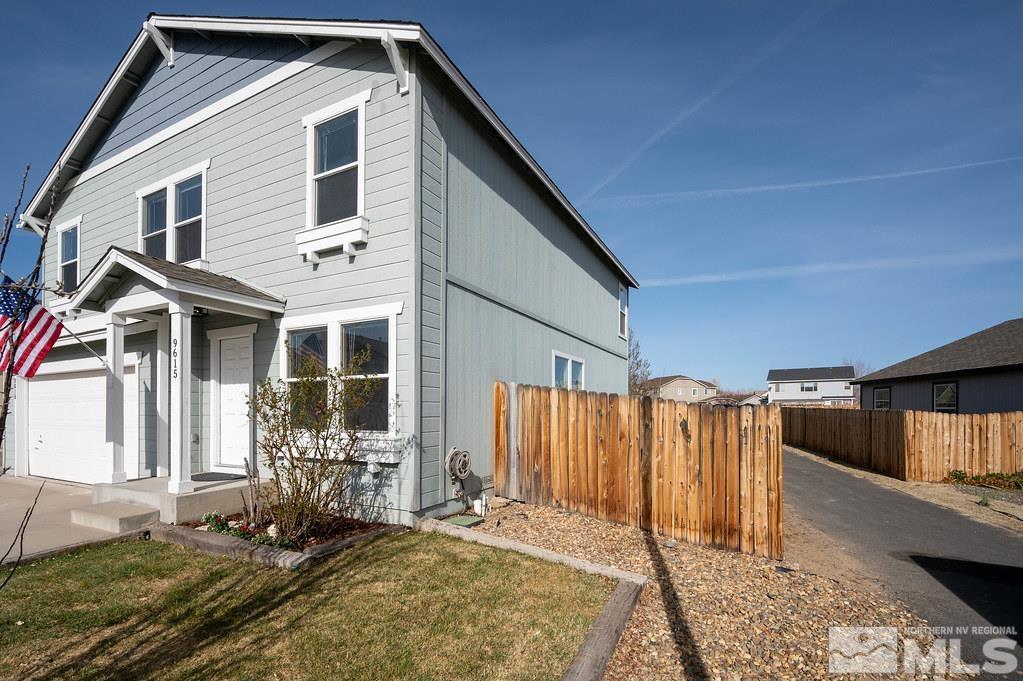 9615 Autumn Leaf Way Reno, NV 89506 - Photo 3 of 24 a front view of a house with a yard