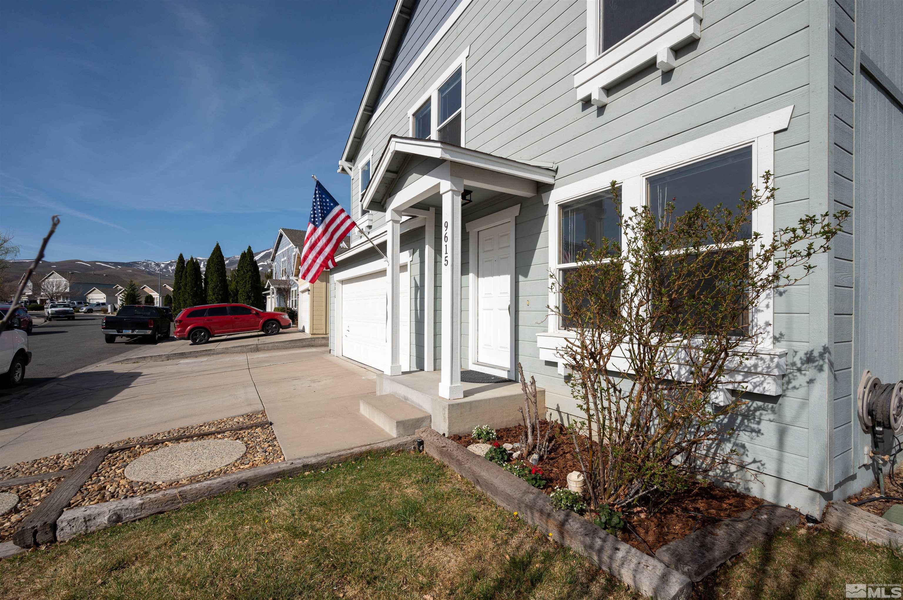 9615 Autumn Leaf Way Reno, NV 89506 - Photo 4 of 24 a view of a house with a yard