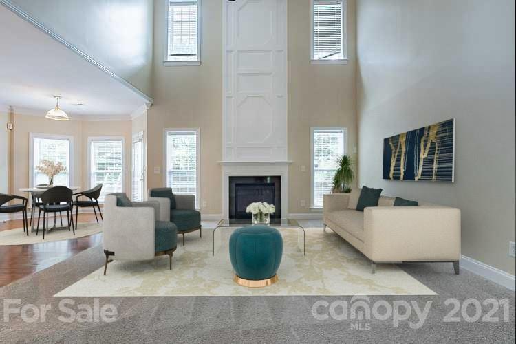 3546 Weddington Ridge Lane Matthews, NC 28105 - Photo 2 of 24 a living room with furniture and a fireplace