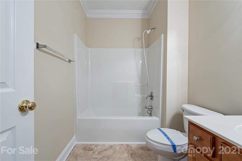 3546 Weddington Ridge Lane Matthews, NC 28105 - Photo 14 of 24 a bathroom with a toilet and a shower