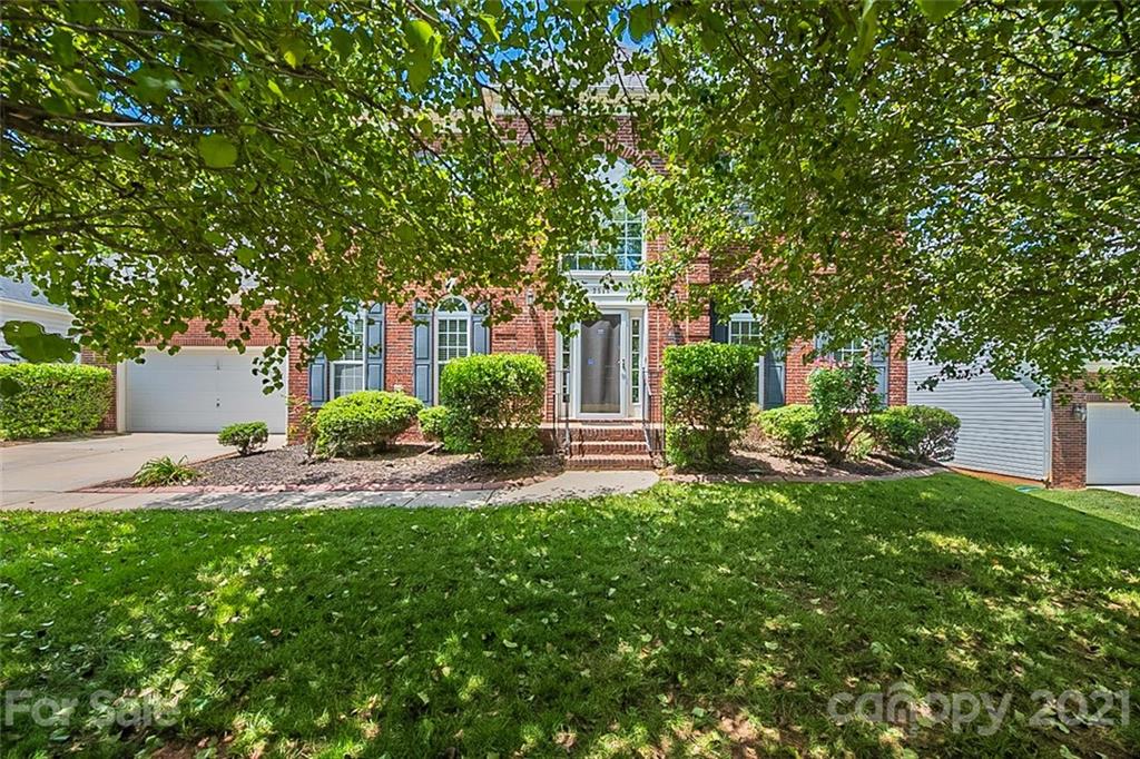 3546 Weddington Ridge Lane Matthews, NC 28105 - Photo 24 of 24 a view of backyard of house with green space