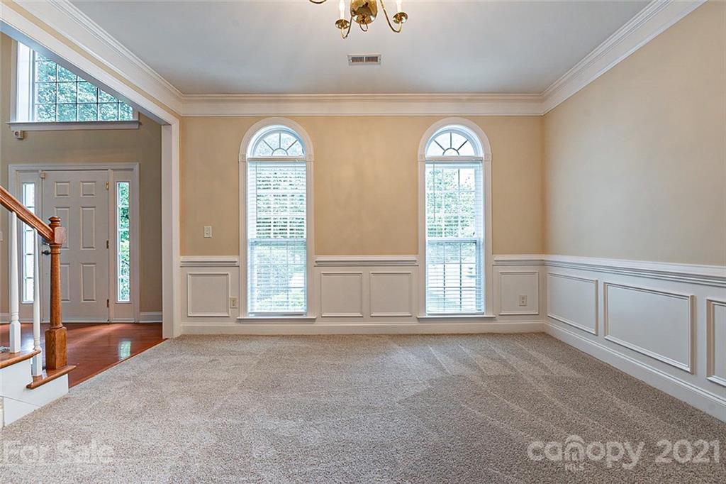 3546 Weddington Ridge Lane Matthews, NC 28105 - Photo 10 of 24 an empty room with windows and entryway