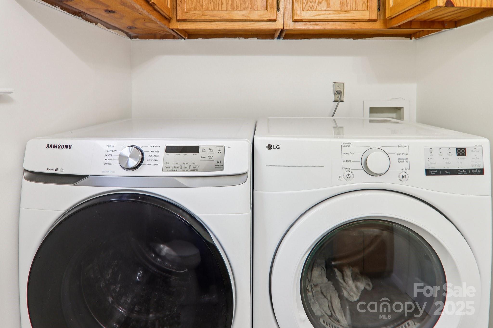 136 Ridge Brook Drive Weaverville, NC 28787 - Photo 18 of 41 a utility room with dryer and washer