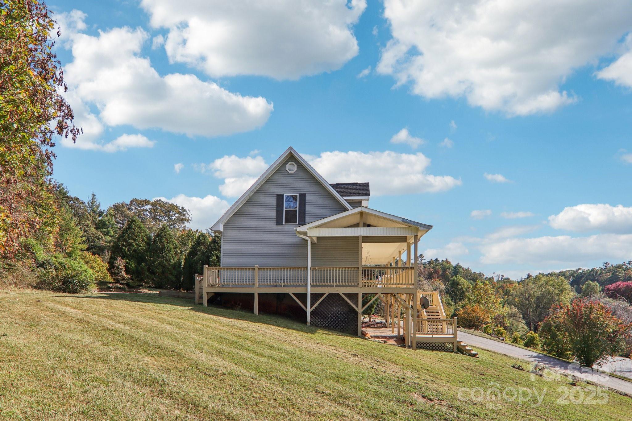 136 Ridge Brook Drive Weaverville, NC 28787 - Photo 34 of 41 a view of a house with a backyard