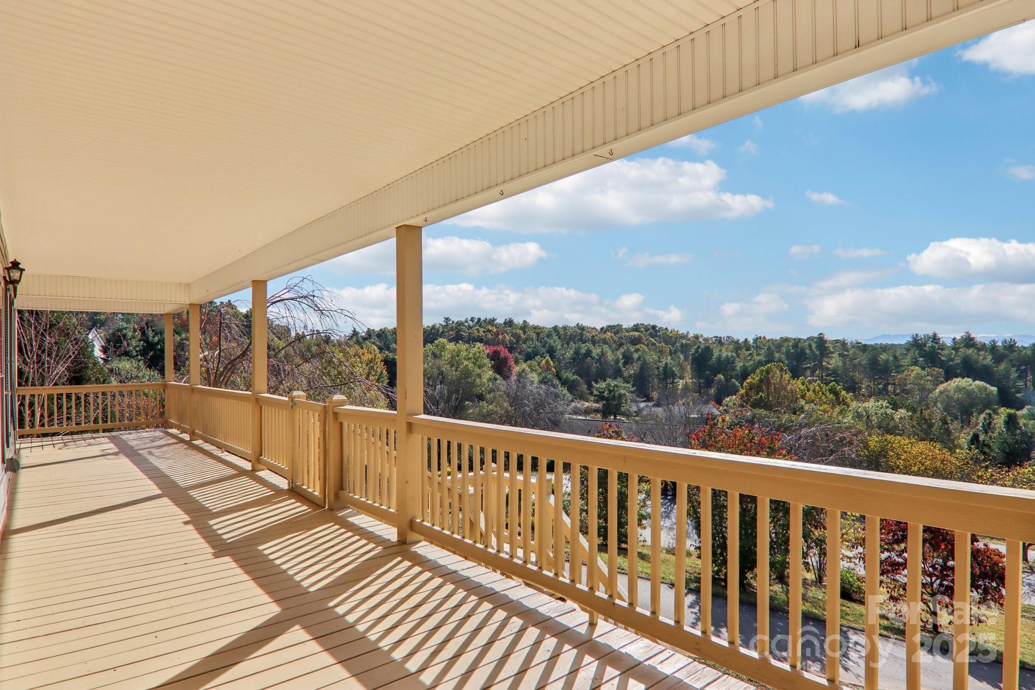 136 Ridge Brook Drive Weaverville, NC 28787 - Photo 7 of 41 a view of balcony with wooden floor