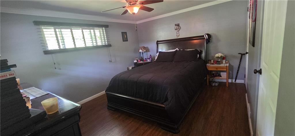551 Muse-Bishop Road McDonald, PA 15057 - Photo 16 of 38 a bedroom with a bed and wooden floor
