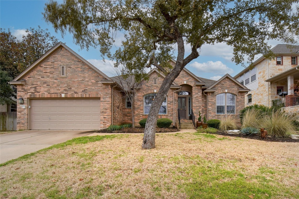 6925 Via Correto Drive Austin, TX 78749 - Photo 1 of 1 a front view of a house with a yard