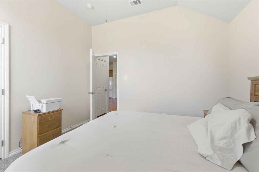 817 Huebner Way Burleson, TX 76028 - Photo 26 of 35 Another view of the bedroom which shows the door into the hall.