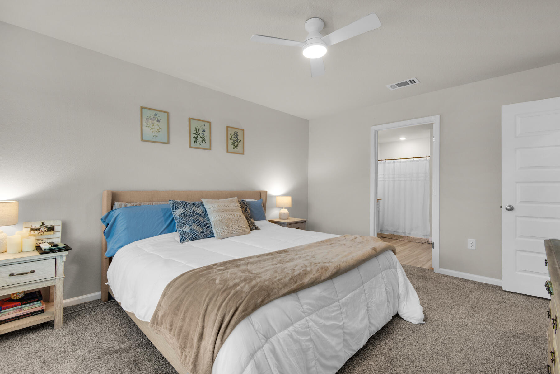 924 Sandbar Loop Crestview, FL 32539 - Photo 13 of 25 a bed room with a bed and a lamp