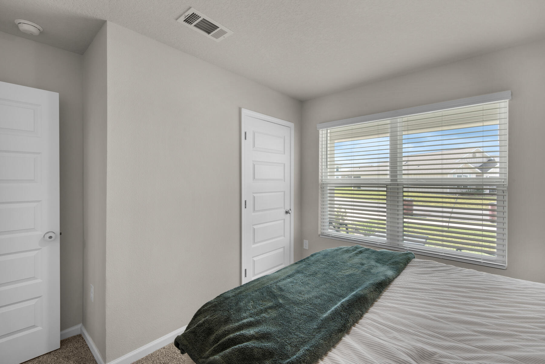 924 Sandbar Loop Crestview, FL 32539 - Photo 23 of 25 a bedroom with a bed and a window