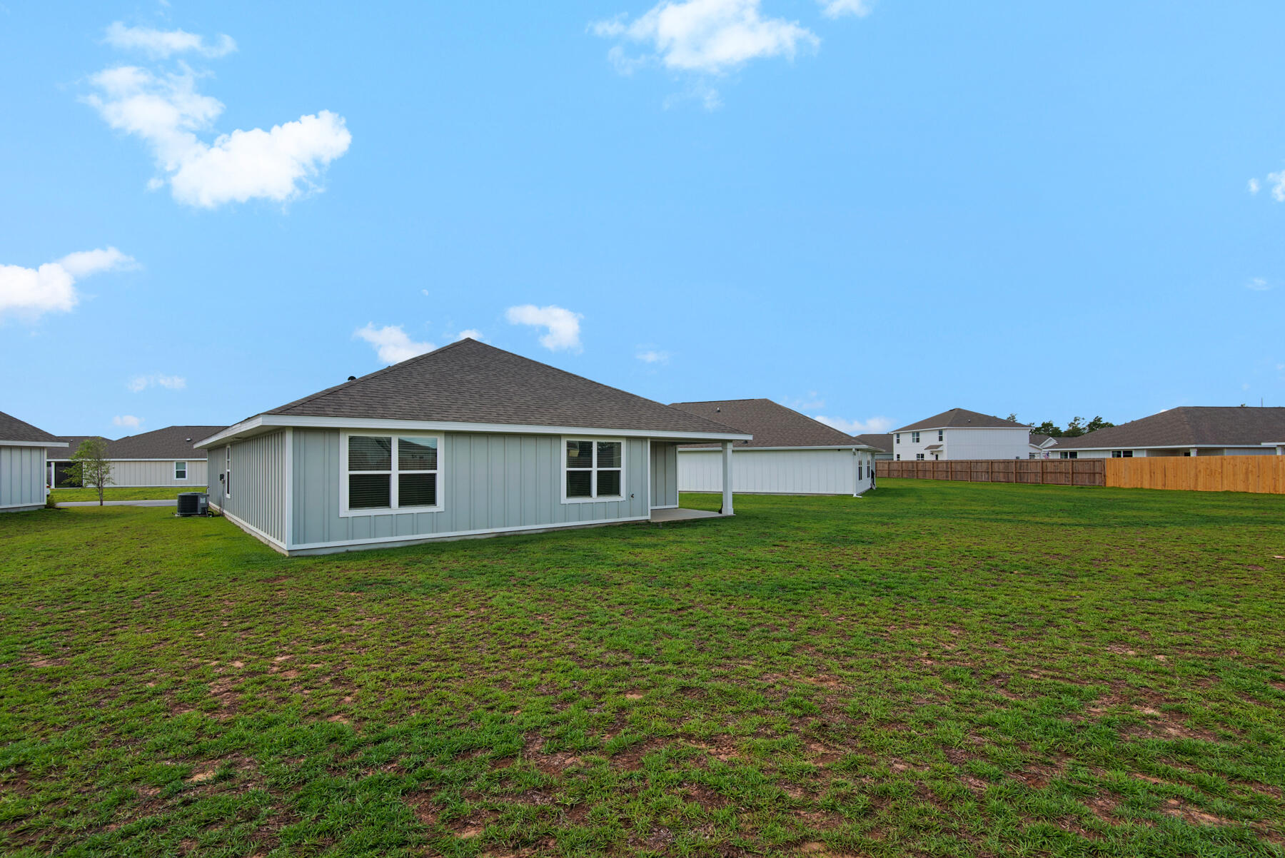 924 Sandbar Loop Crestview, FL 32539 - Photo 24 of 25 a view of a house with a yard