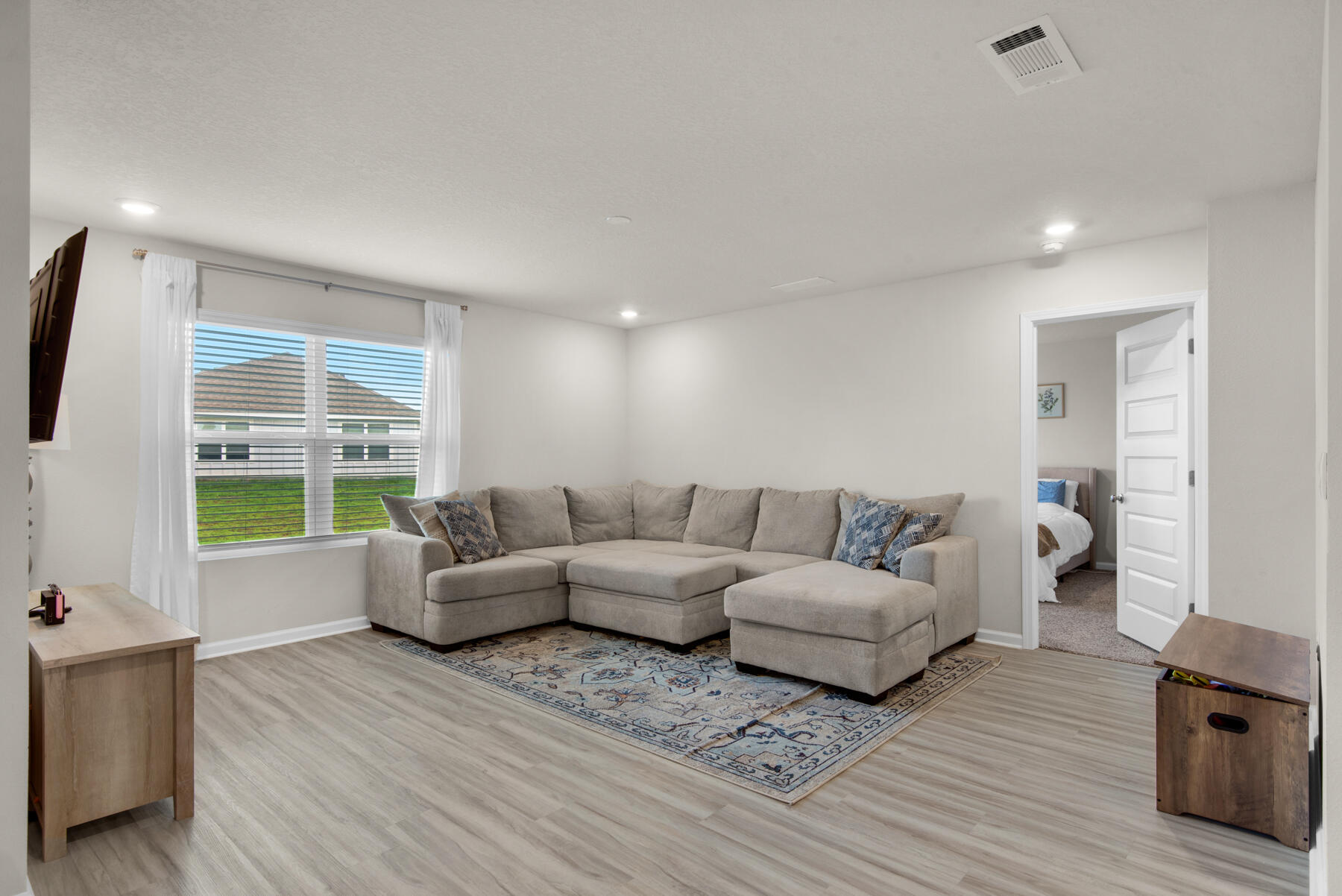 924 Sandbar Loop Crestview, FL 32539 - Photo 4 of 25 a living room with furniture and a large window