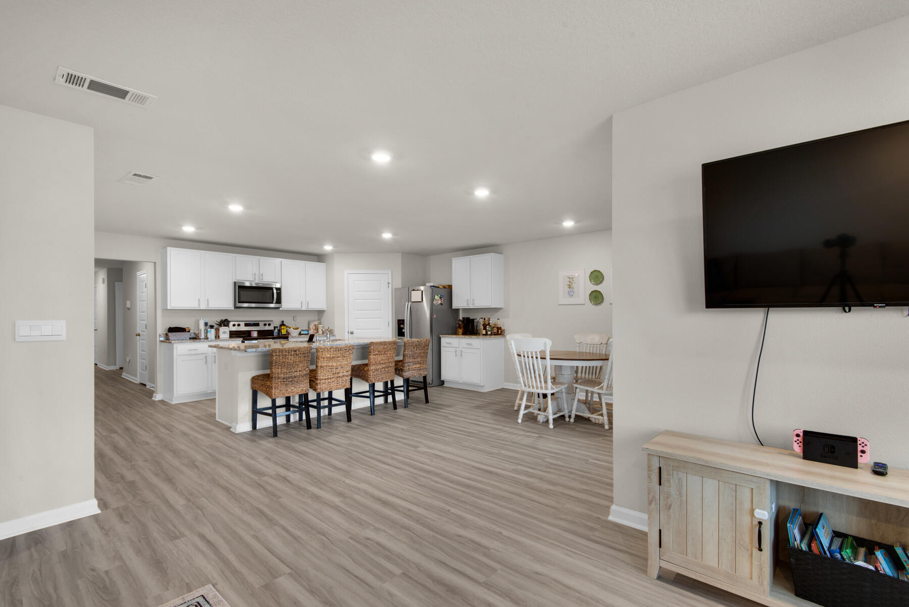 924 Sandbar Loop Crestview, FL 32539 - Photo 6 of 25 a living room with furniture and a flat screen tv