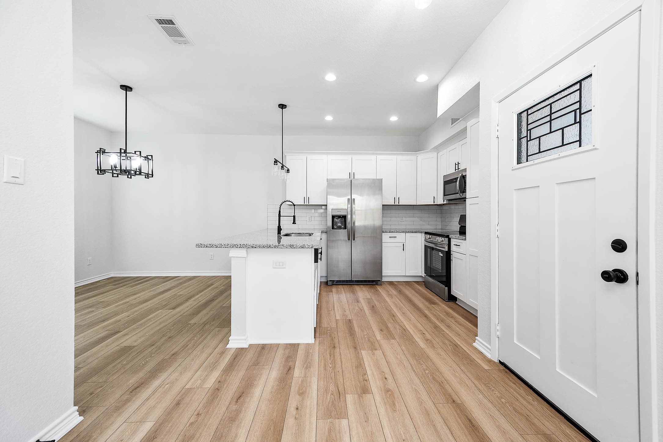 2022 Hampton Street, Unit A B Houston, TX 77088 - Photo 13 of 31 a view of kitchen with wooden floor