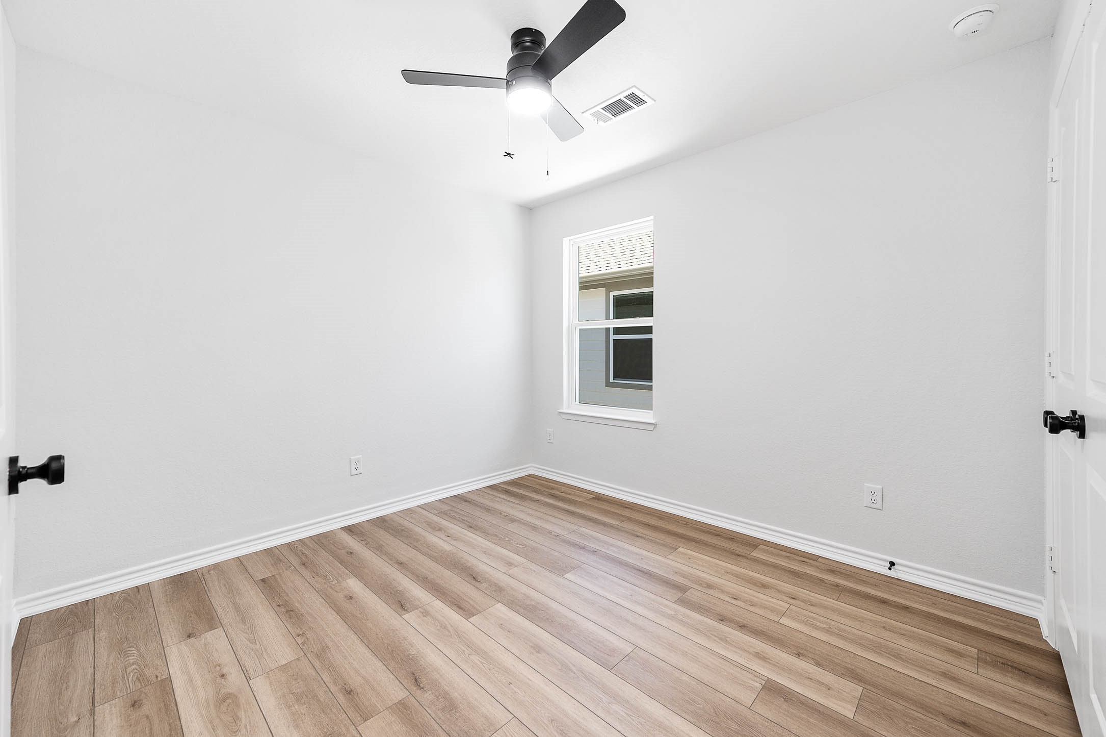 2022 Hampton Street, Unit A B Houston, TX 77088 - Photo 24 of 31 a view of a room with a dishwasher and a window