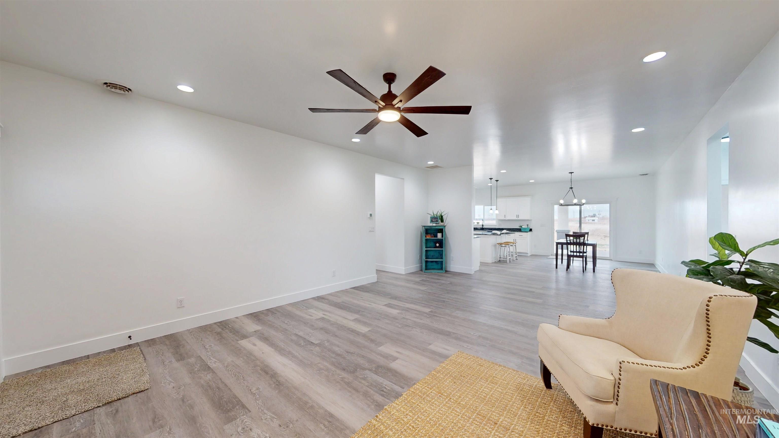 304 Shillington Court Rupert, ID 83350 - Photo 12 of 40 Sitting room featuring light wood-style floors, ceiling fan, and recessed lighting