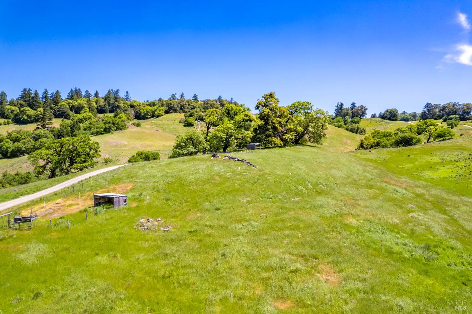 19780 Yorkville Ranch Road Yorkville, CA 95494 - Photo 18 of 49 a view of a lake with houses in the background
