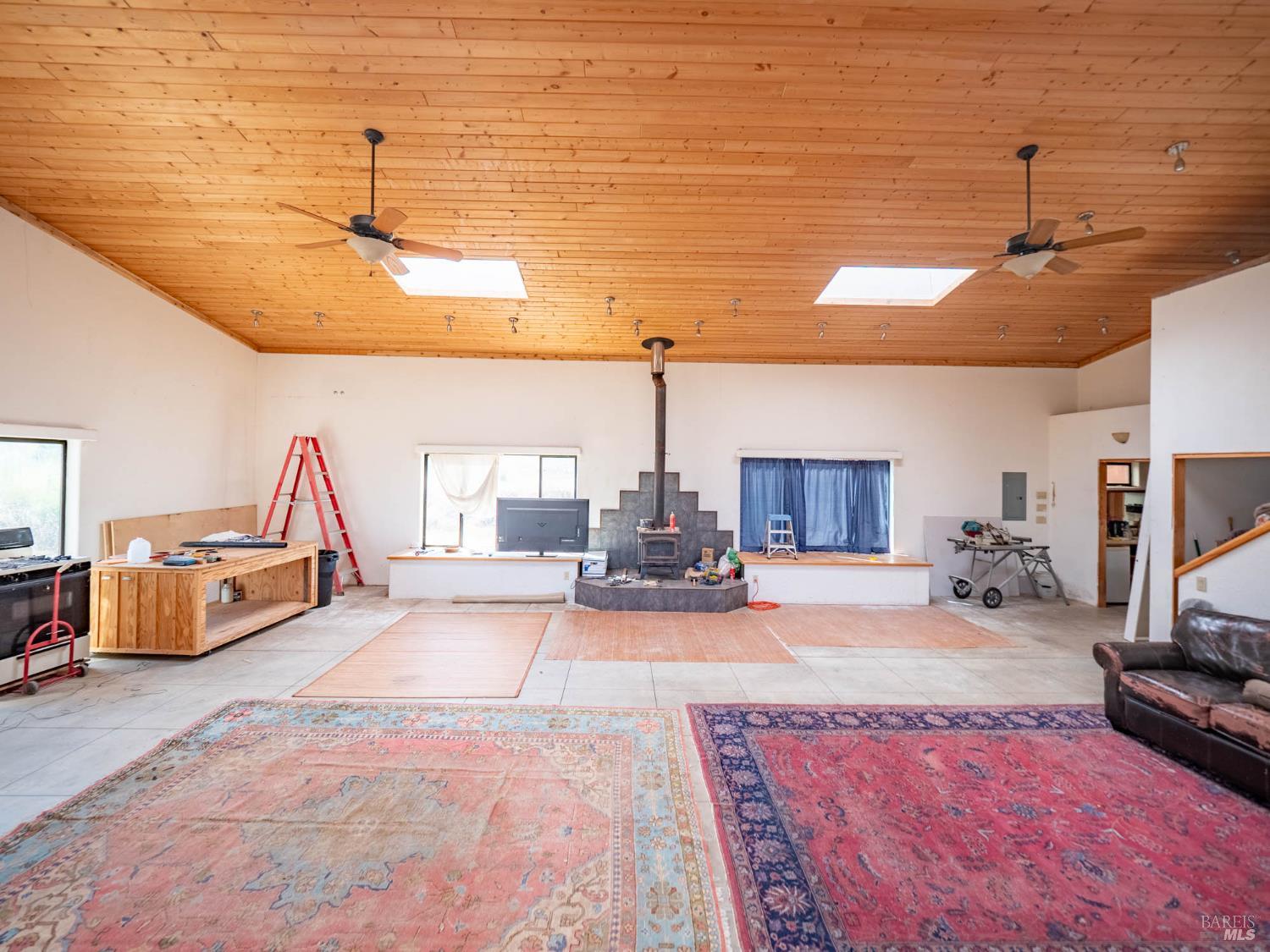 19780 Yorkville Ranch Road Yorkville, CA 95494 - Photo 38 of 49 a view of a livingroom with furniture and a flat screen tv