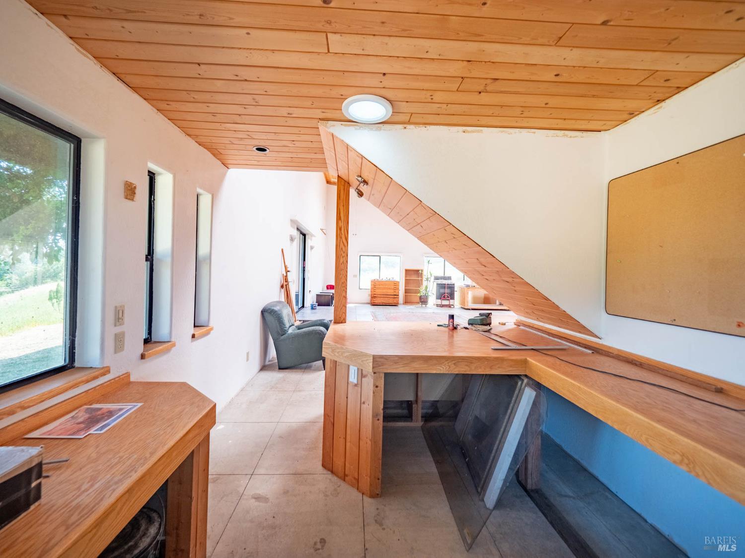 19780 Yorkville Ranch Road Yorkville, CA 95494 - Photo 43 of 49 a bedroom with a bed and a large window