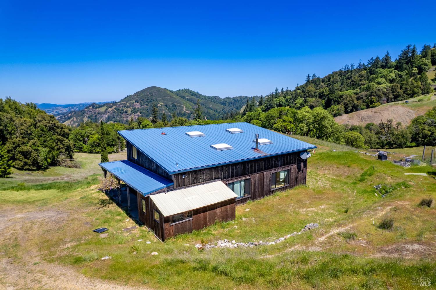 19780 Yorkville Ranch Road Yorkville, CA 95494 - Photo 10 of 49 a view of a big house with a big yard