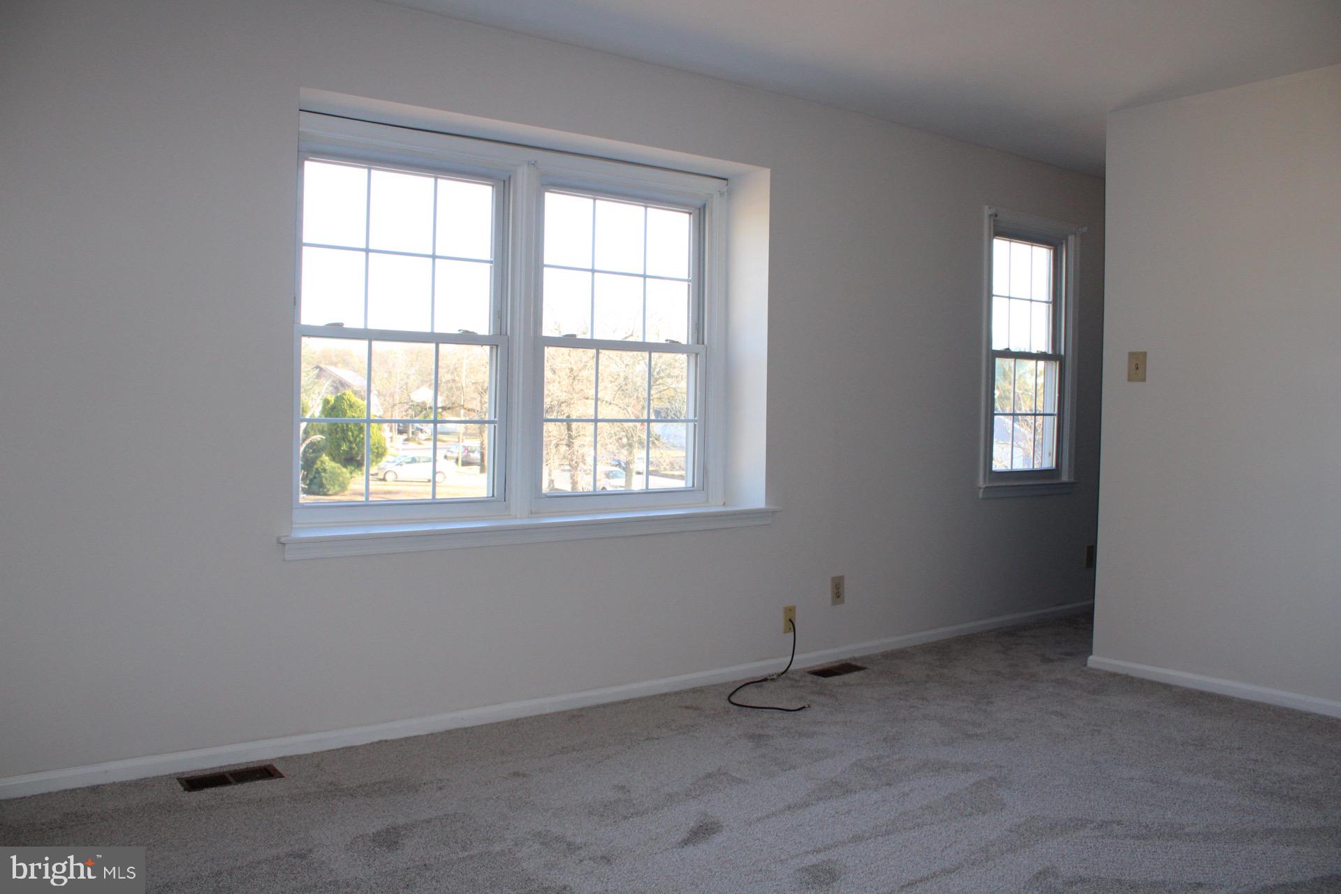 13 Langley Drive Sewell, NJ 08080 - Photo 20 of 31 an empty room with windows