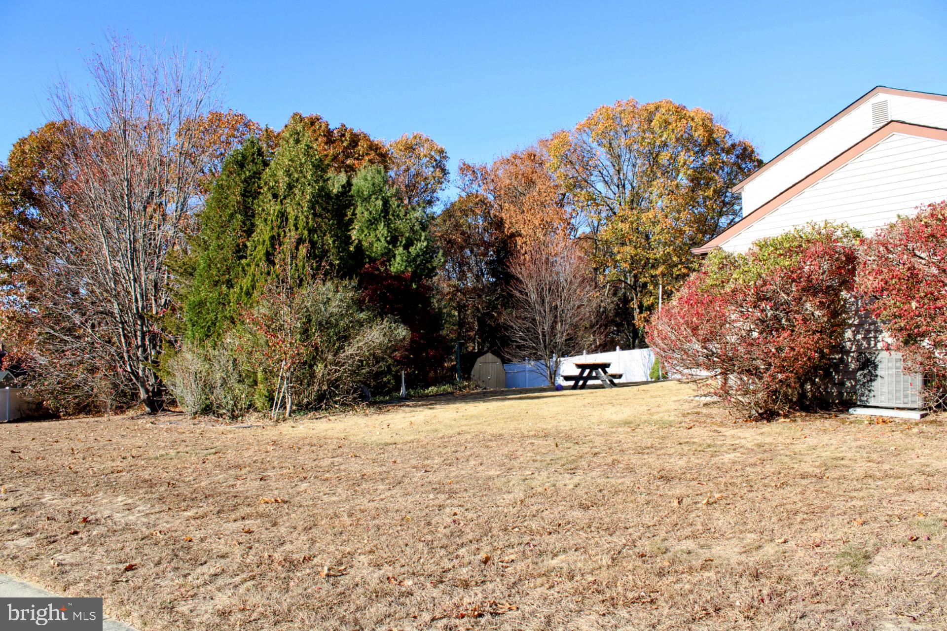 13 Langley Drive Sewell, NJ 08080 - Photo 2 of 31 a view of road covered with snow