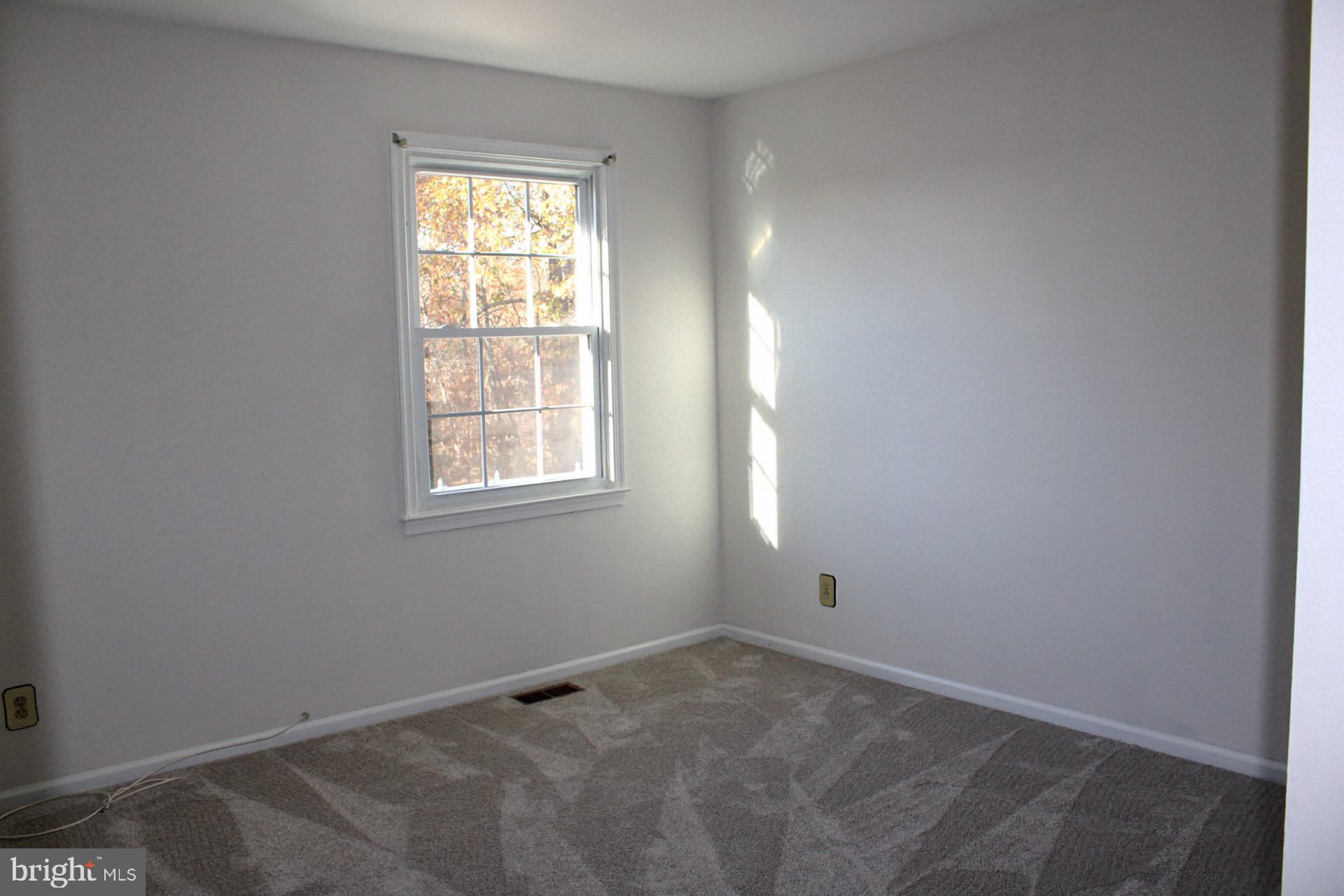 13 Langley Drive Sewell, NJ 08080 - Photo 23 of 31 an empty room with a window