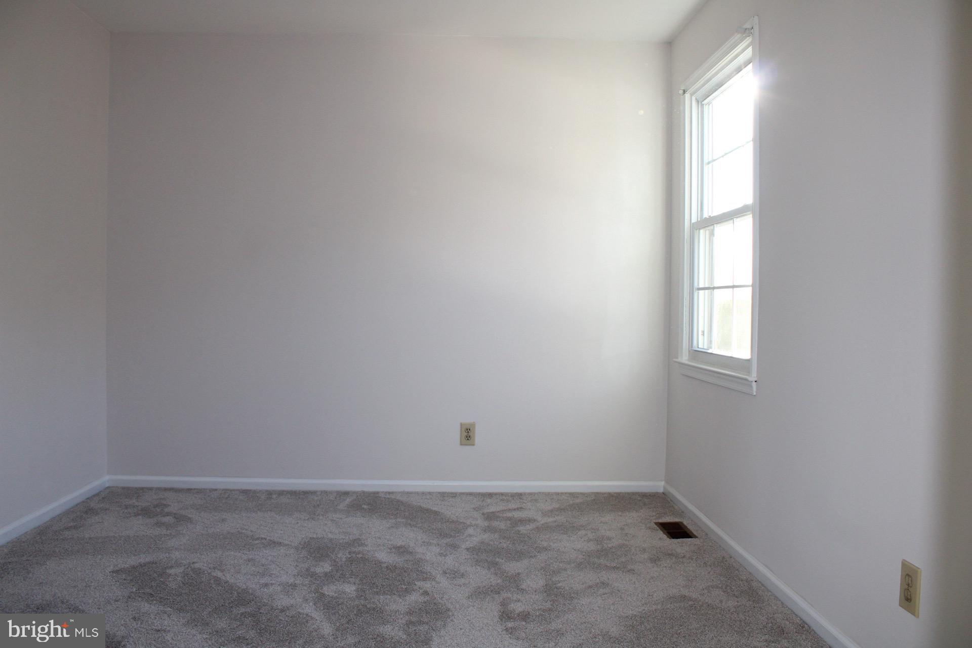 13 Langley Drive Sewell, NJ 08080 - Photo 24 of 31 an empty room with a window