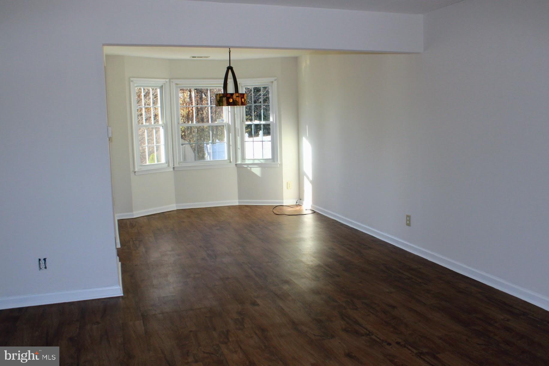 13 Langley Drive Sewell, NJ 08080 - Photo 8 of 31 wooden floor in an empty room with a window
