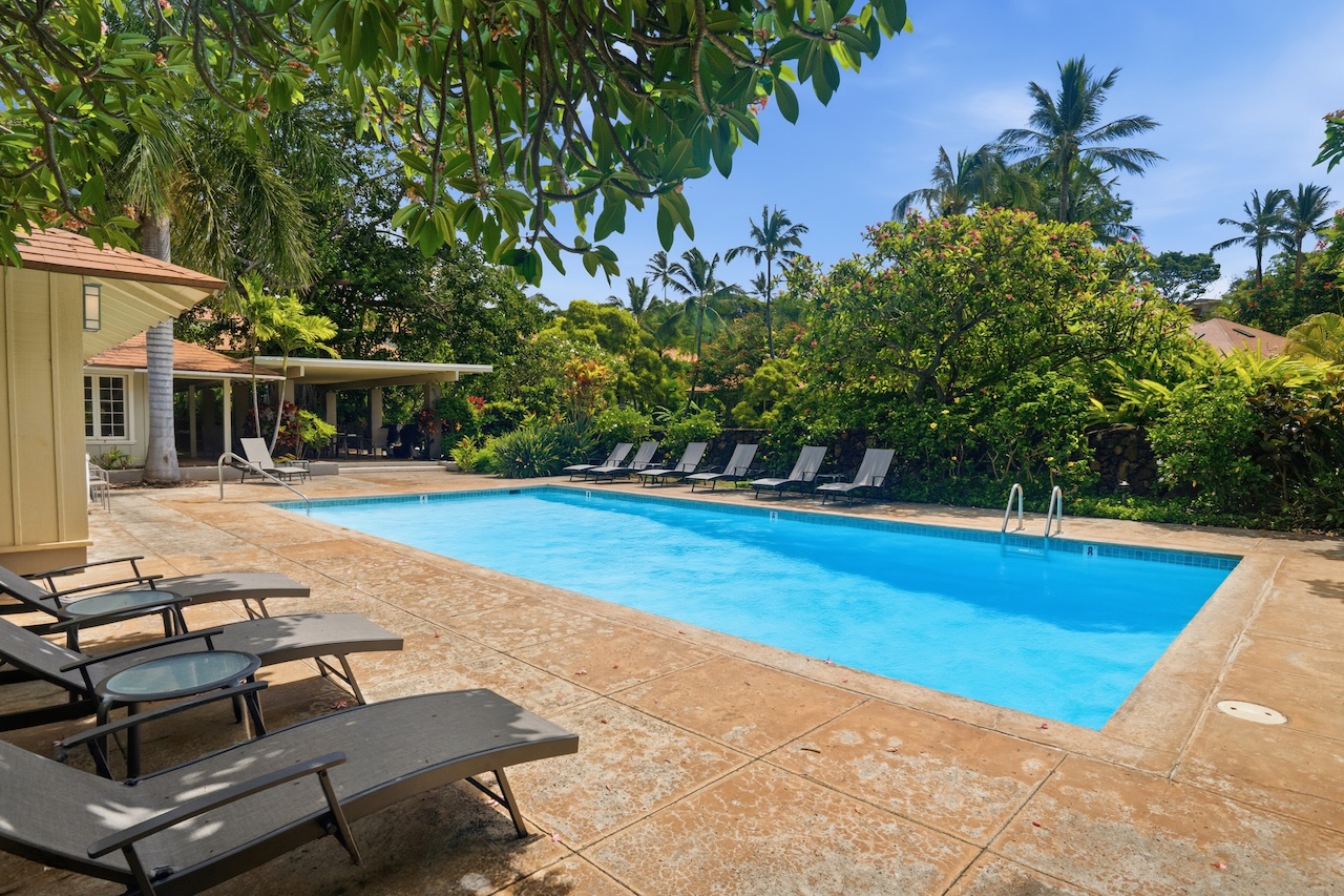 2330 Ho'ohu Road, Unit 27 Koloa, HI 96756 - Photo 22 of 30 a view of a swimming pool with lounge chair