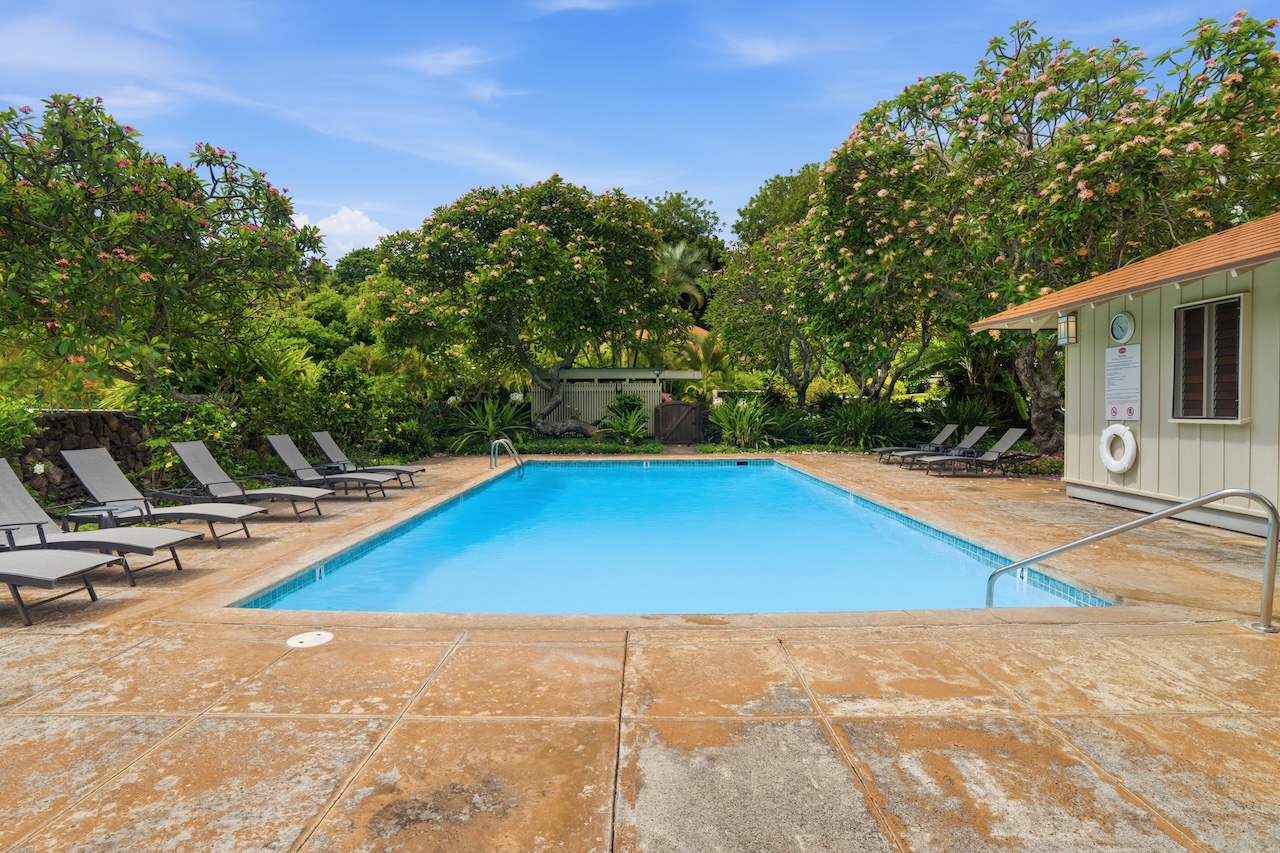 2330 Ho'ohu Road, Unit 27 Koloa, HI 96756 - Photo 23 of 30 a view of a swimming pool with lounge chair