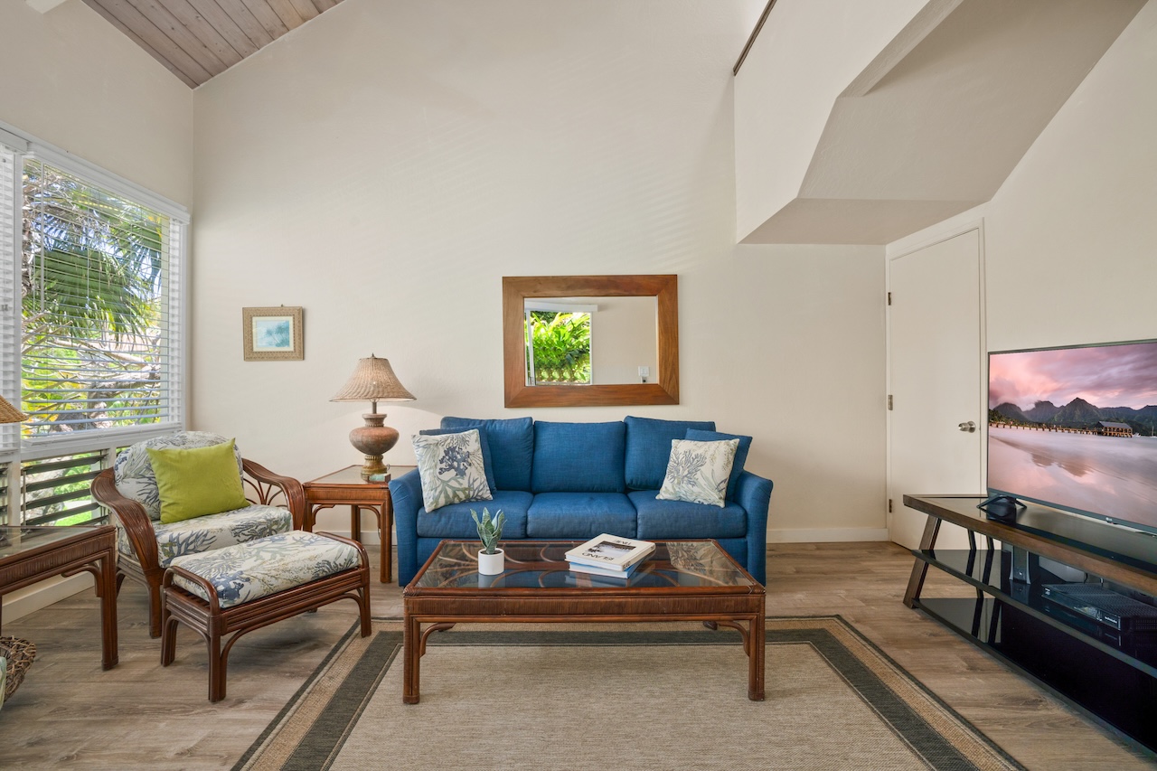 2330 Ho'ohu Road, Unit 27 Koloa, HI 96756 - Photo 4 of 30 a living room with furniture and a window