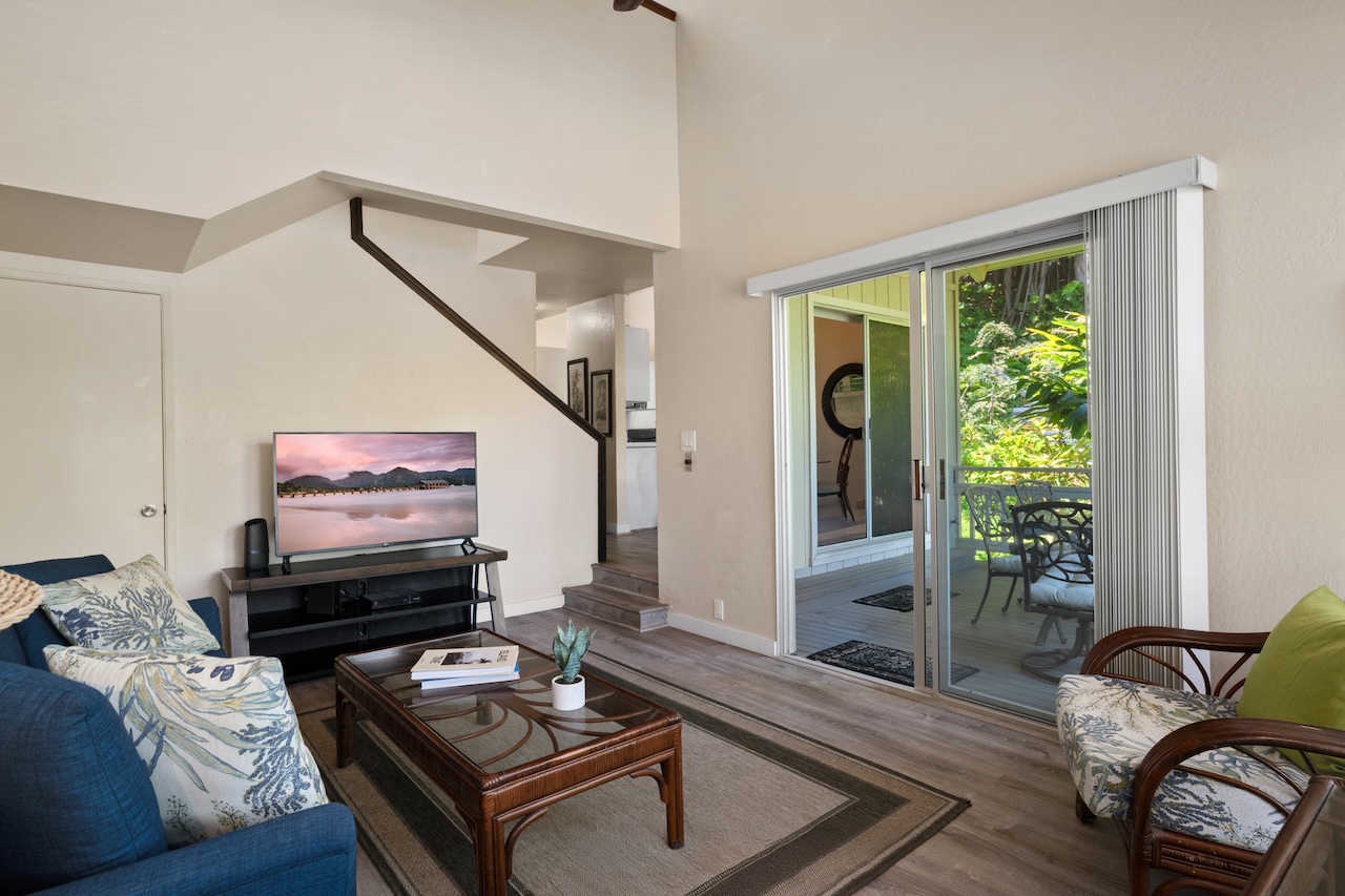 2330 Ho'ohu Road, Unit 27 Koloa, HI 96756 - Photo 8 of 30 a living room with furniture and a window