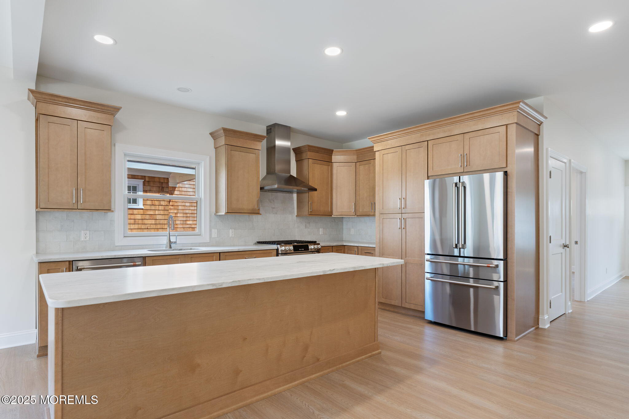 1413 George Street Point Pleasant, NJ 08742 - Photo 18 of 51 a kitchen with stainless steel appliances granite countertop a refrigerator sink and stove
