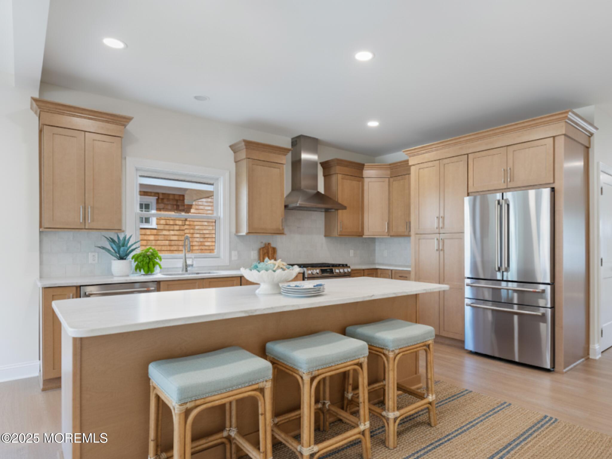 1413 George Street Point Pleasant, NJ 08742 - Photo 19 of 51 a kitchen with stainless steel appliances granite countertop a sink refrigerator and microwave