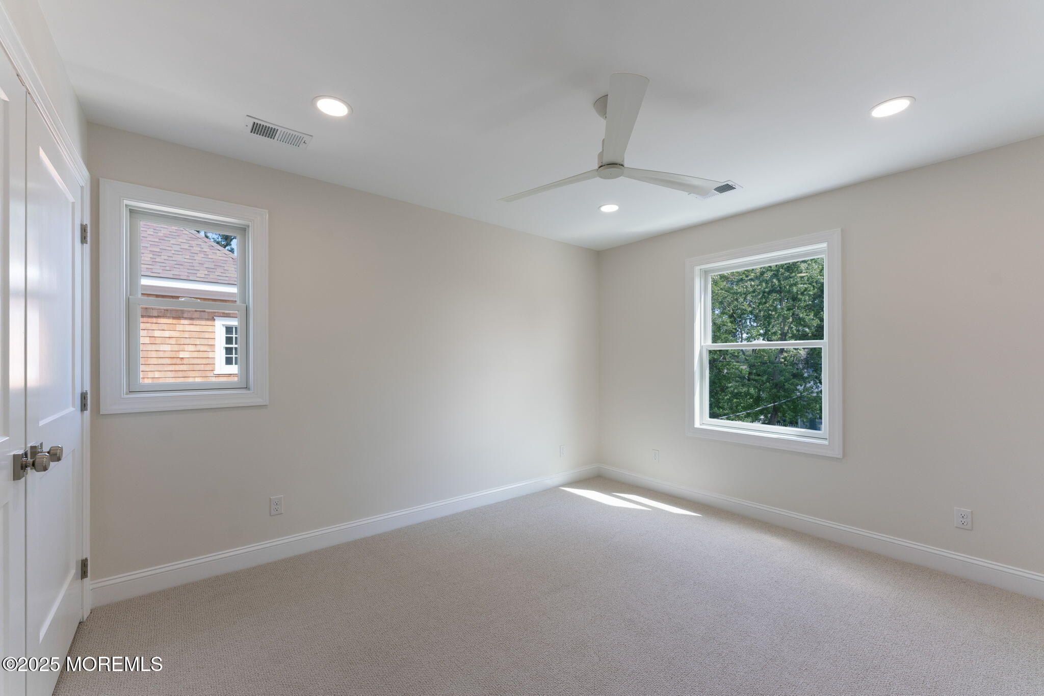 1413 George Street Point Pleasant, NJ 08742 - Photo 42 of 51 an empty room with a window and a mirror