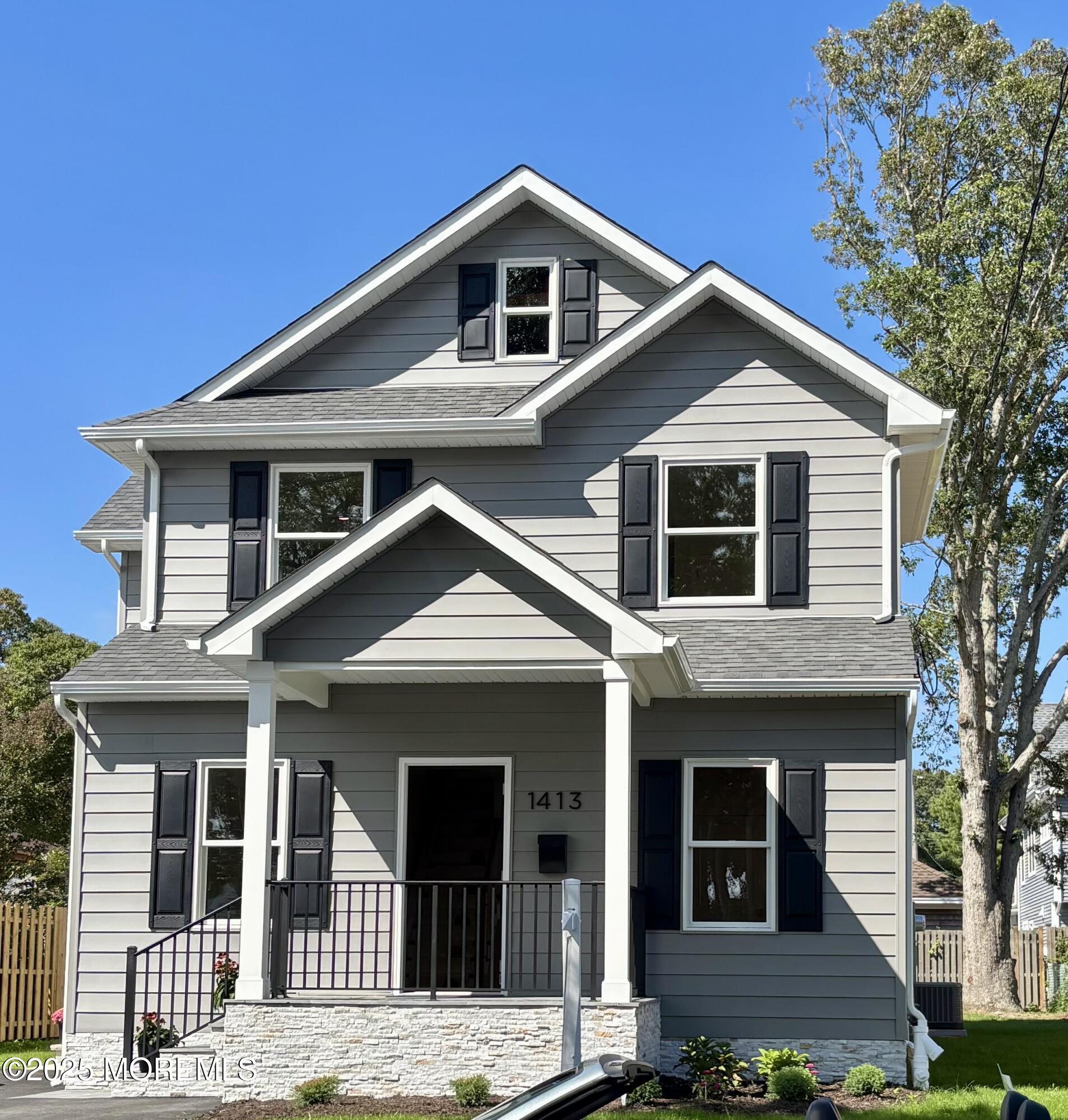 1413 George Street Point Pleasant, NJ 08742 - Photo 5 of 51 a front view of a house with a yard