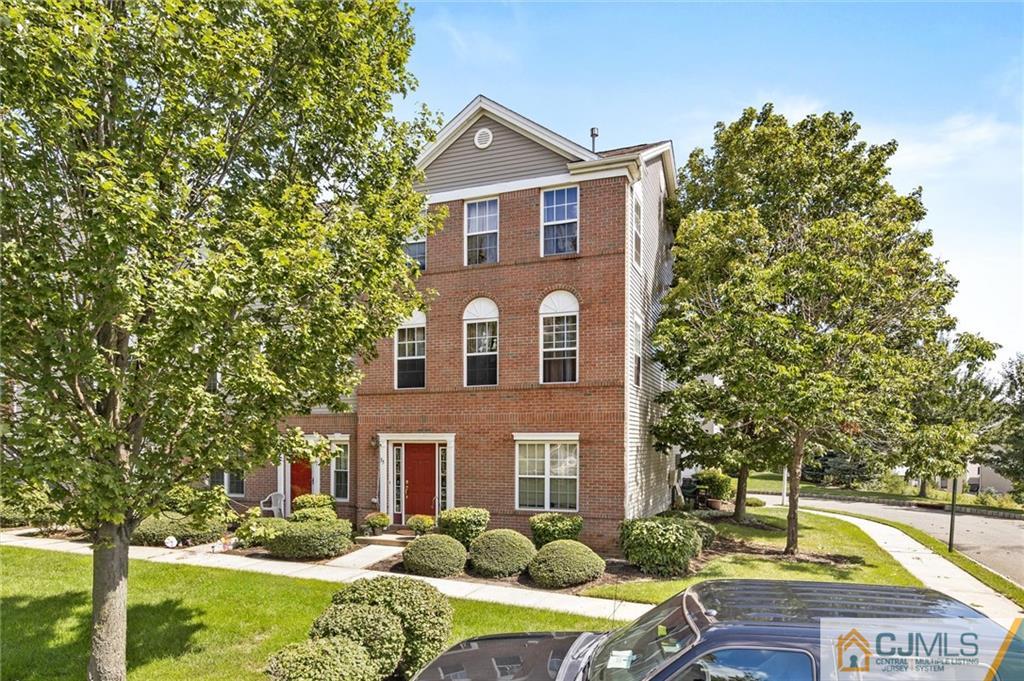 35 Rojewski Way Sayreville, NJ 08859 - Photo 2 of 23 a front view of a house with garden