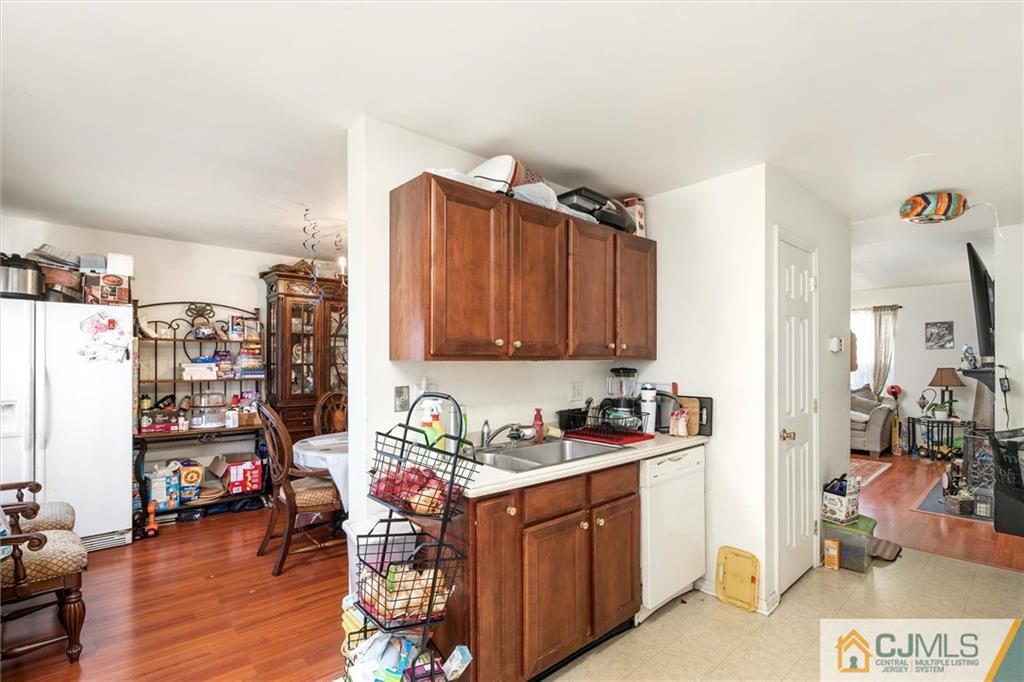 35 Rojewski Way Sayreville, NJ 08859 - Photo 6 of 23 a room with furniture a rug toys and a wooden floor