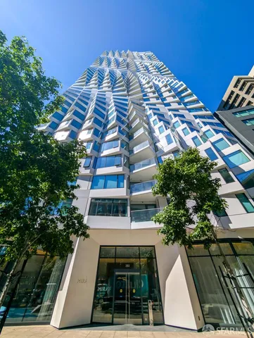 a view of balcony with table and chairs