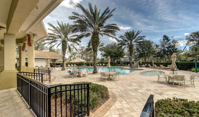 a view of a park with swings and slides