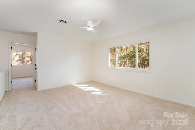 an empty room with windows