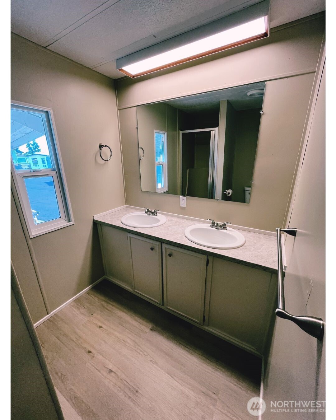 67 Jade Street Walla Walla, WA 99362 - Photo 15 of 21 a bathroom with a sink and a mirror