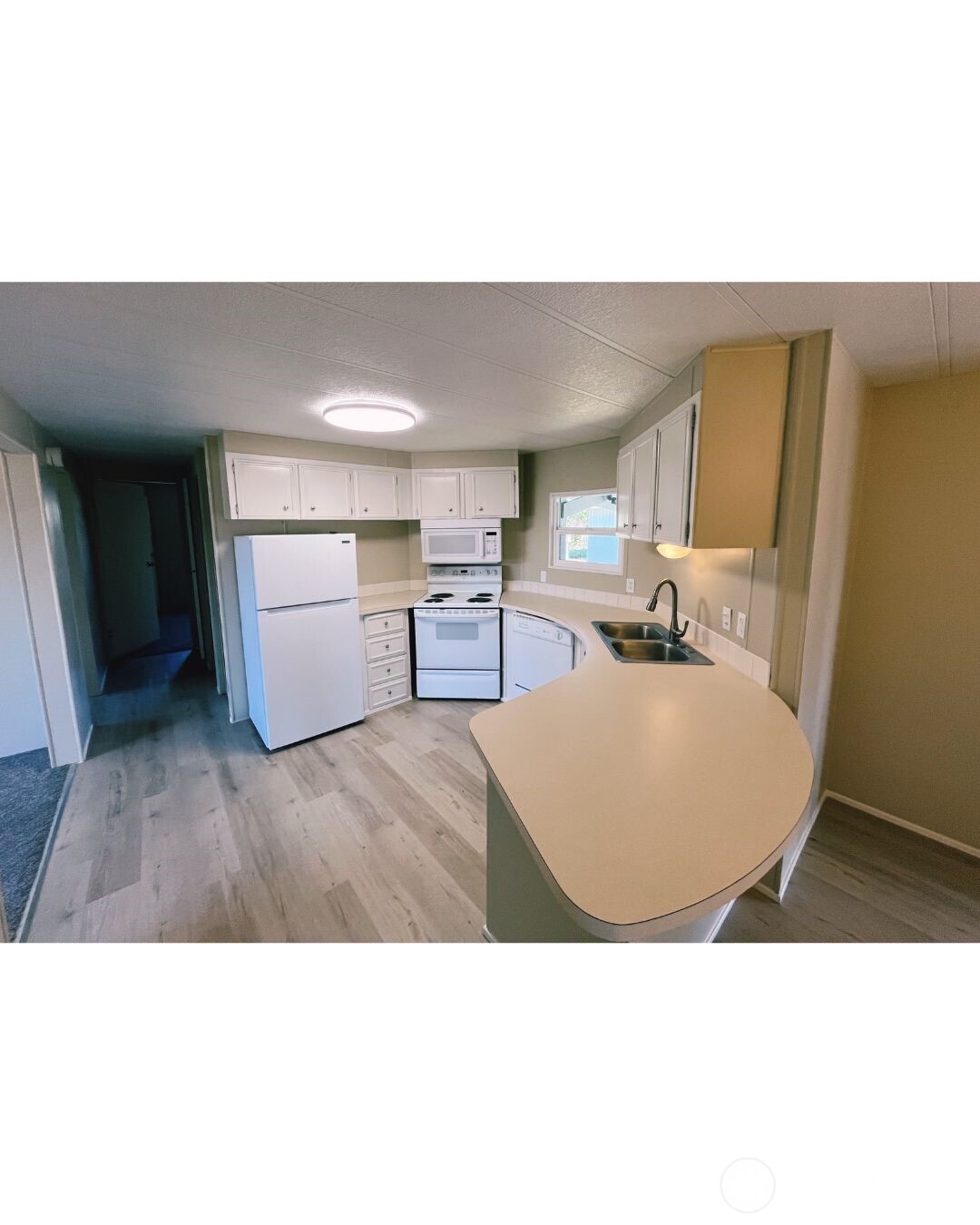 67 Jade Street Walla Walla, WA 99362 - Photo 6 of 21 a living room with furniture and a wooden floor
