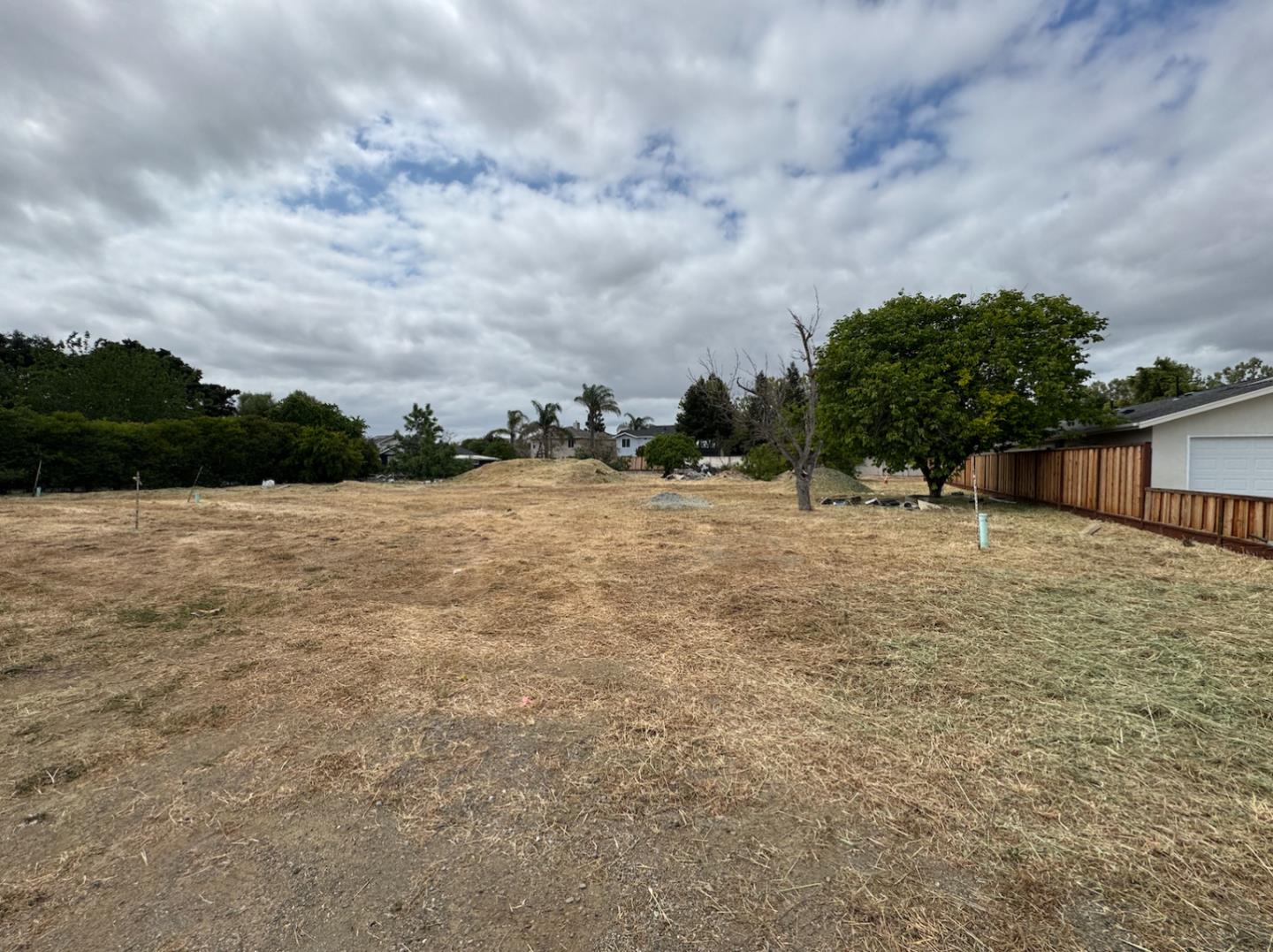 111 Farrell Avenue Gilroy, CA 95020 - Photo 2 of 3 a backyard of a house with lots of green space